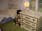 Twin bed and matching dresser.  On dresser, electrified GWTW lamp (not drilled, so can revert to oil)