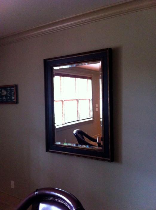 Beveled wall mirror with wood frame