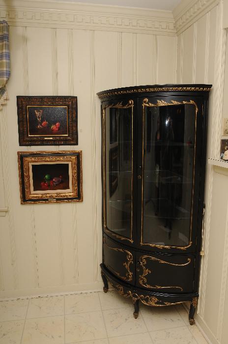 Gorgeous Black Painted Cabinet with Glass Shelves. Oil Paintings to top it off.