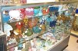 Glassware, head vases, pottery and show case.