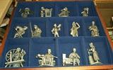 Pewter colonial figures in walnut display box.