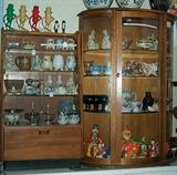 Clown collection, Mr. Peanut items, figurines, China cabinet and small display cabinet.