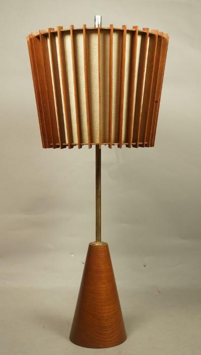 Lot 8  -  American Modern Walnut Table Lamp. Walnut wood cone base. Slatted walnut shade. Brass trim.-- Dimensions:  H: 30 inches: W: 13 inches --- 