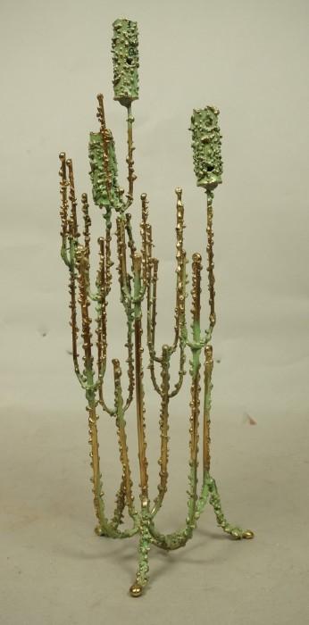 Lot 12  -  C JERE Brutalist  Candlestick Sculpture. Green paint patina finish on brass colored metal. Textured metal rods with three candle holders. Signed.-- Dimensions:  H: 15.5 inches: W: 5 inches --- 