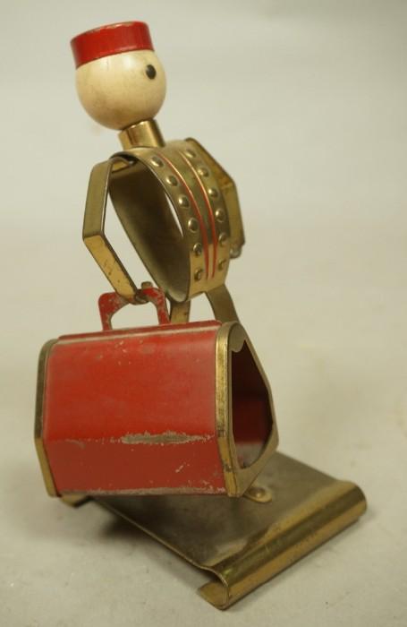 Lot 17  -  CHASE style Porter Bellman Figural Match Holder. Art Deco. Brass with painted details. Removable suitcase. -- Dimensions:  H: 6.5 inches: W: 3.25 inches: D: 3.5 inches --- 