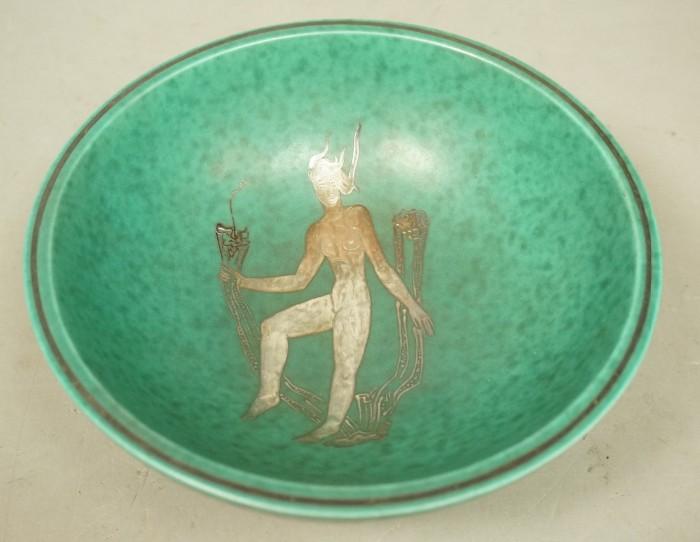 Lot 23  -  GUSTAVSBERG Sweden Argenta Bowl. Silver Design of female nude floating amongst sea plants. Green glaze on five feet. Marked. Paper label. -- Dimensions:  H: 3 inches: W: 7 inches --- 