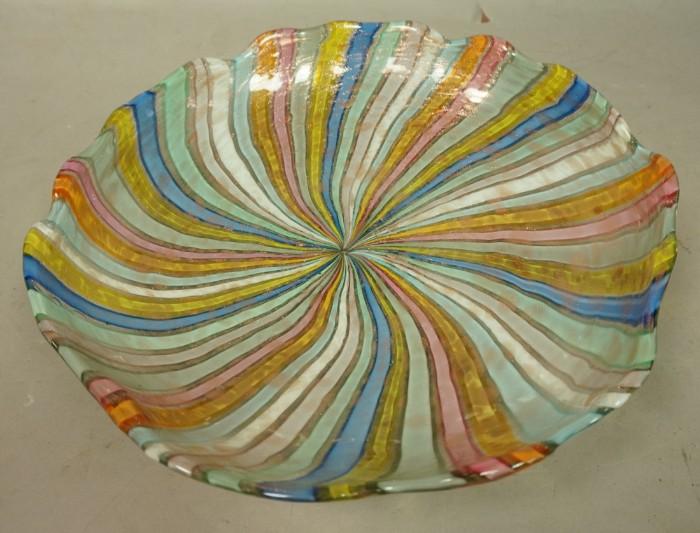 Lot 31  -  Murano Italy Art Glass Bowl. Radiating colorful ribbon design. Scalloped edge. Copper foil details. Not marked. -- Dimensions:  H: 3.25 inches: W: 14 inches --- 
