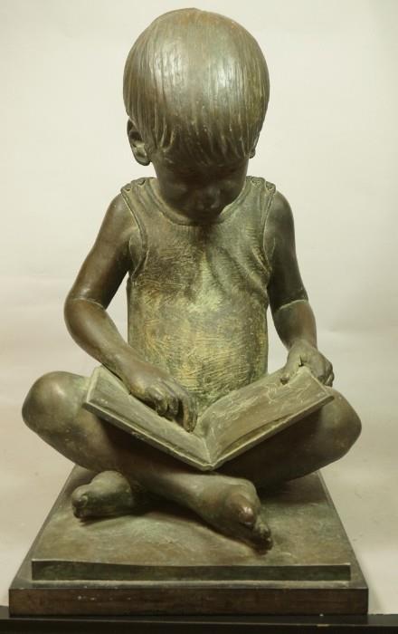 Lot 36  -  CHRIS PARKS '69 Large Bronze Reading Child Figural Sculpture. Titled "Kurt";  boy reading a book. Signed. -- Dimensions:  H: 22 inches: W: 12.5 inches: D: 18 inches --- 