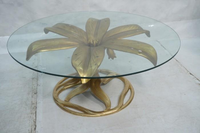 Lot 46  -  ARTHUR COURT Floral Glass Coffee Table. 1/2" thick glass. Gold metal finish. -- Dimensions:  H: 17 inches: W: 42 inches: D: 42 inches --- 