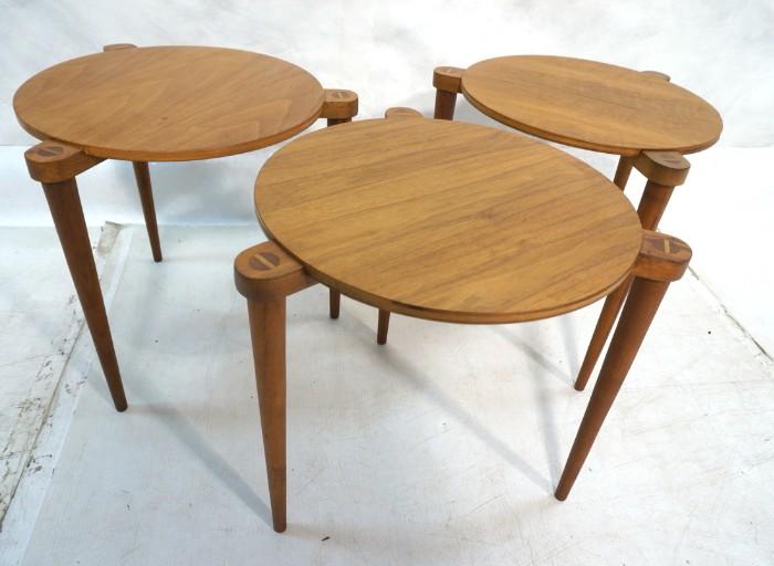 Lot 57  -  Set Three Round Nesting Tables. Each with three peg legs in extended supports. Not marked. -- Dimensions:  H: 19 inches: W: 17.5 inches: D: 17.5 inches --- 