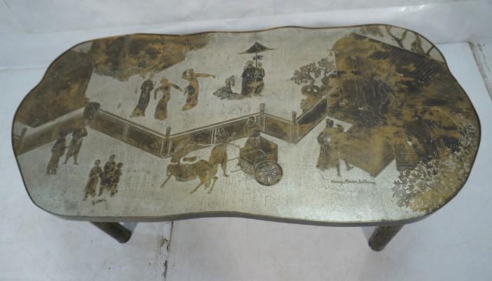 Lot 66  -  Phillip And Kelvin LaVerne Coffee Table.  Shaped Cocktail Table with Asian decorated Top.  Legs with arches.  -- Dimensions:  H: 17 inches: W: 47 inches: D: 23 inches --- 