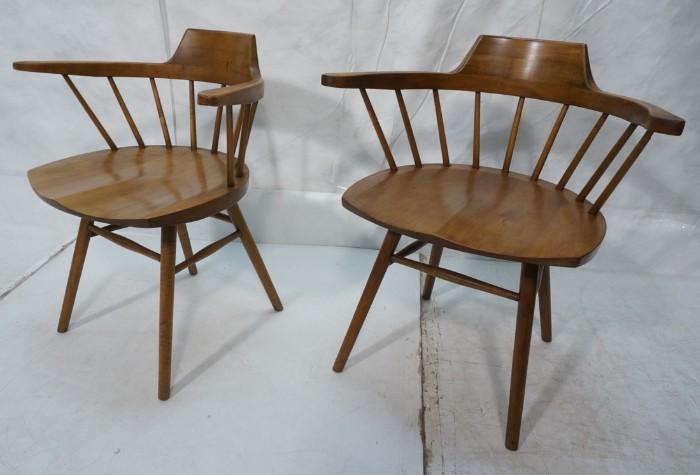 Lot 69  -  Pair Nakashima for Knoll Captain Chairs.  Tapered legs.  Plank seats.  Unmarked.-- Dimensions:  H: 29 inches: W: 26.75 inches: D: 20 inches --- 