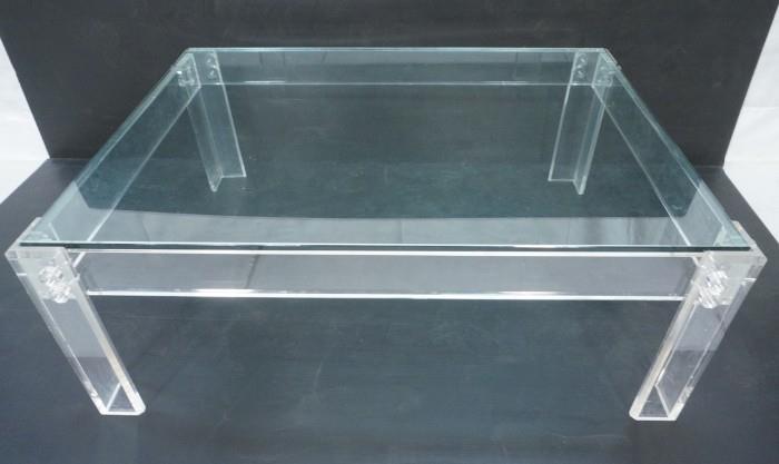 Lot 72  -  70's Modern Lucite and glass Coffee Cocktail Table.  Thick acrylic frame with Thick glass top.-- Dimensions:  H: 18.5 inches: W: 51 inches: D: 39 inches --- 