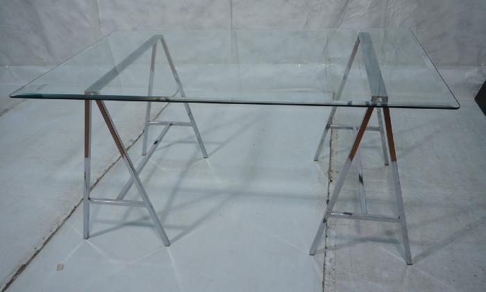 Lot 95  -  Decorator Glass and Chrome Table/Desk.  Beveled glass top on Heavy Chrome A frame bases.  Square tube.-- Dimensions:  H: 28.5 inches: W: 60 inches: D: 36 inches --- 