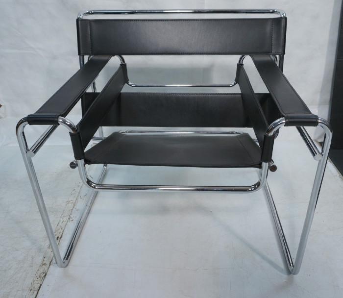 Lot 99  -  Knoll Studios Wassily Lounge Chair.  Marcel Breuer. Black Leather.  Tubular Chrome.-- Dimensions:  H: 29 inches: W: 31 inches: D: 27.5 inches --- 