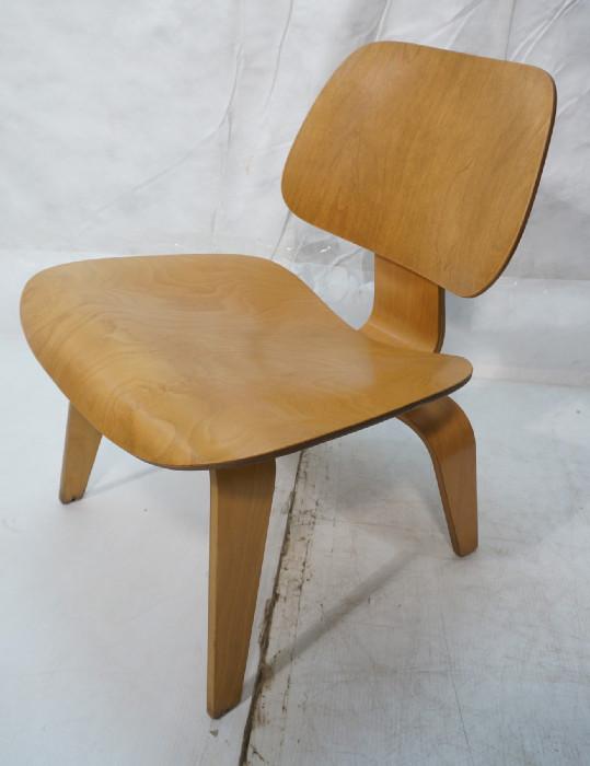 Lot 104  -  Eames LCW Herman miller Lounge Chair.  Unmarked.-- Dimensions:  H: 26.25 inches: W: 22.25 inches: D: 24 inches --- 