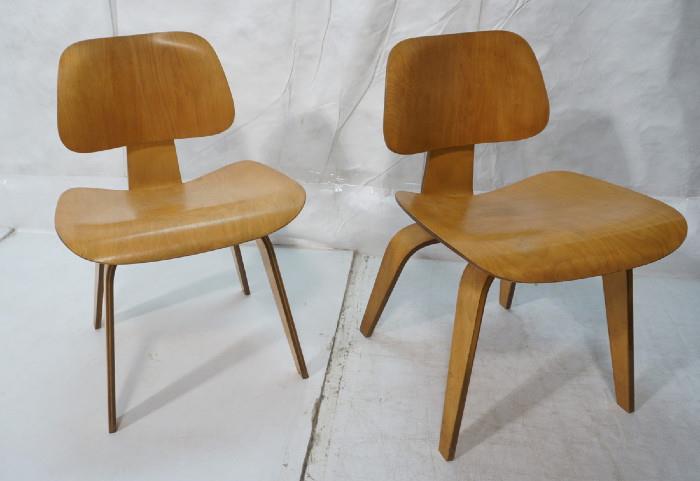 Lot 105  -  Pair Eames DCW Herman miller Chairs.  Unmarked.-- Dimensions:  H: 29 inches: W: 19.25 inches: D: 21.75 inches --- 