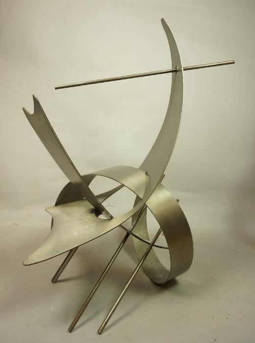 Lot 111  -  Modernist Industrial Metal Sculpture.  Abstract with rods.  Unmarked.-- Dimensions:  H: 25.25 inches: W: 20 inches: D: 15 inches --- 