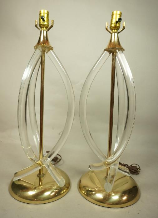 Lot 114  -  Pair 70's Modern Acrylic Table Lamps.  Dorothy Thorpe Style.  Gold tone mounts.-- Dimensions:  H: 24 inches: W: 8.5 inches --- 