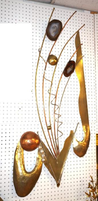 Lot 145  -  Artist Signed Mixed Metal Wall Sculpture. Abstract form with two real agate slices incorporated into design.-- Dimensions:  H: 56 inches: W: 25 inches --- 