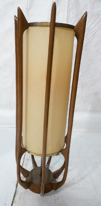 Lot 155  -  Tall Cylinder American Modern Walnut Table Lamp. Walnut uprights with brass trim. Cylinder shade. -- Dimensions:  H: 38 inches: W: 14.5 inches --- 