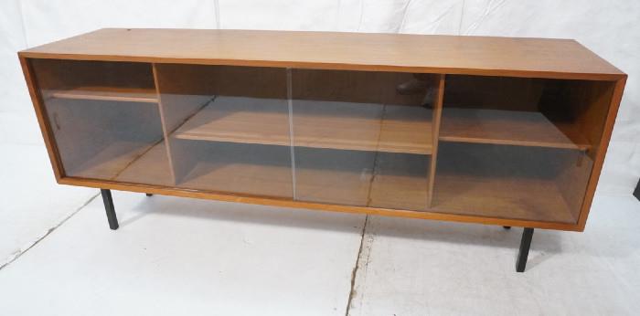 Lot 162  -  Glass Door Danish Teak Low Cabinet Credenza. Black metal legs added to cabinet.-- Dimensions:  H: 28.75 inches: D: 18 inches: L: 70 inches --- 