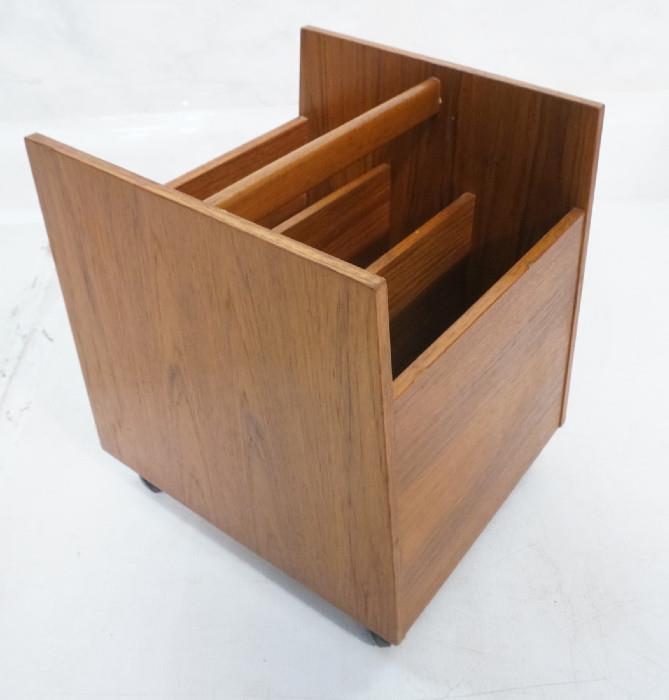 Lot 164  -  BRUKSBO Danish Teak Rolling Magazine Rack. Slanted sides. Marked-- Dimensions:  H: 17 inches: W: 13.75 inches: D: 16 inches --- 