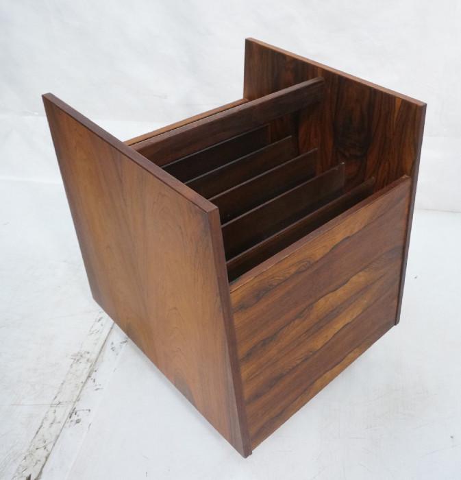 Lot 165  -  BRUKSBO Danish ROSEWOOD Rolling Magazine Rack. Slanted sides. Six divided sections. Marked-- Dimensions:  H: 17.75 inches: W: 13.75 inches: D: 16 inches --- 
