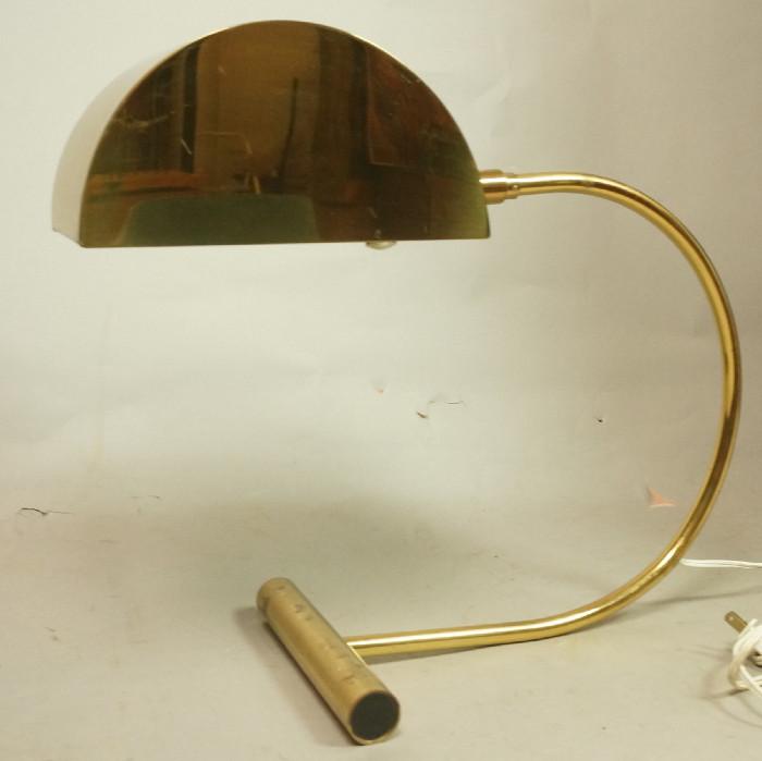 Lot 193  -  KOCH LOWY Brass OMI Table Lamp. Arched arm with domed shade. T form base. Marked. -- Dimensions:  H: 14.5 inches: W: 15 inches: D: 7.25 inches --- 