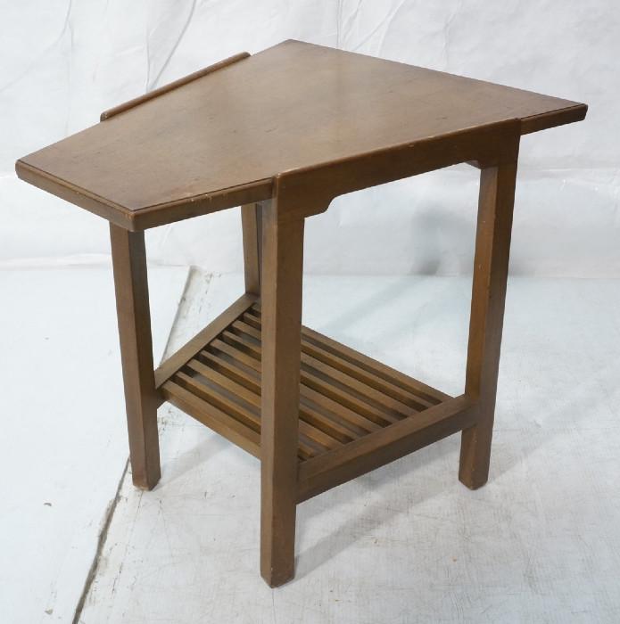 Lot 195  -  DUNBAR American Modern Walnut Side Table. Small Trapezoidal End Table. Lower slatted shelf. Metal tag. -- Dimensions:  H: 22 inches: W: 20.5 inches: D: 23.5 inches --- 