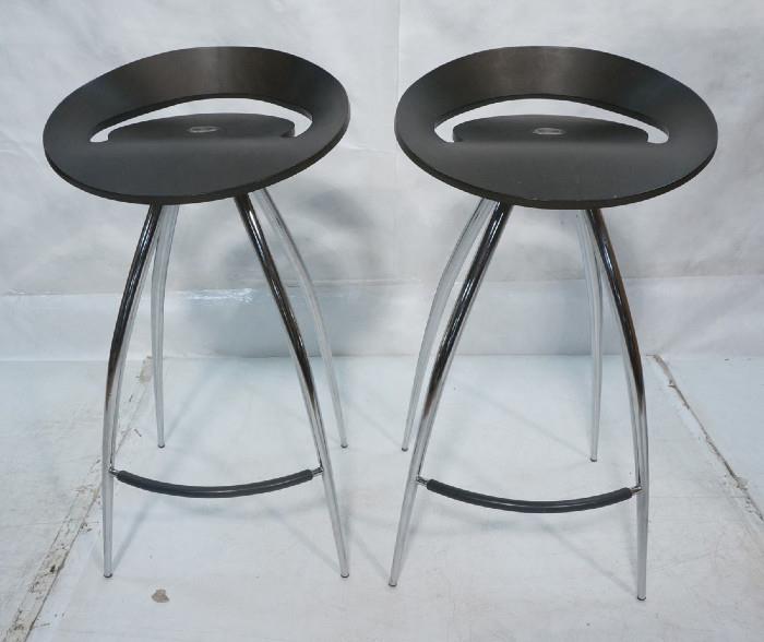Lot 201  -  Pr MAGIS LYRA Modernist Chrome & Black Bar Stools. Design Group Italia by Tecnotube. Tapered saber legs. Laminated Charcoal colored wood seat. Marked.-- Dimensions:  H: 30.5 inches: W: 17 inches --- 