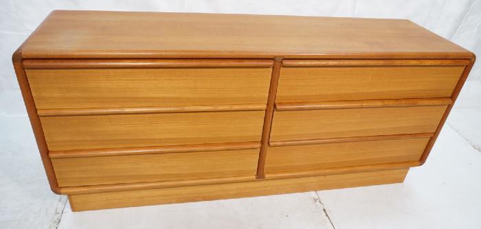 Lot 211  -  Six Drawer Dresser. Danish Modern Teak. Rounded corners. Not marked. Wood self pulls.-- Dimensions:  H: 31 inches: D: 19 inches: L: 70 inches --- 