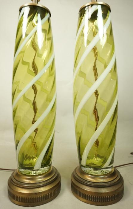 Lot 215  -  Pr Murano style Green Art Glass Table Lamps. Swollen column form. Green glass with white stripes. -- Dimensions:  H: 26 inches: W: 6 inches --- 