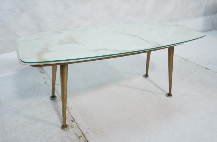 Lot 220  -  Modernist Italian White Marble Coffee Table. Tapered Metal Peg Legs. Shaped glass top.  Marble mounted on wood. -- Dimensions:  H: 16.5 inches: W: 39 inches: D: 18.5 inches --- 