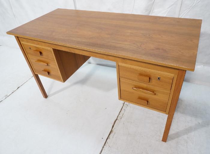 Lot 227  -  Modernist Mid Century Wood Desk. Six Drawer. Two style drawer pulls. -- Dimensions:  H: 29 inches: W: 51.25 inches: D: 24 inches --- 