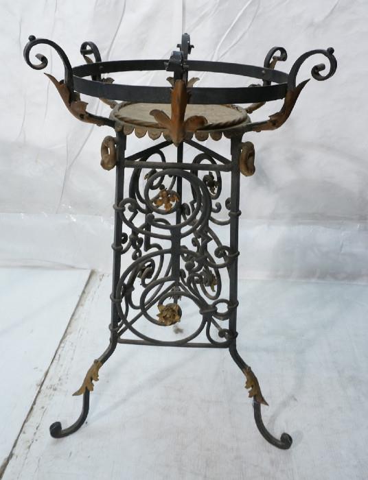 Lot 236  -  Vintage Iron Round Planter Stand. Triangle Base with brass accents. Decorative Ironwork. Painted black-- Dimensions:  H: 33 inches: W: 22 inches: D: 22 inches --- 