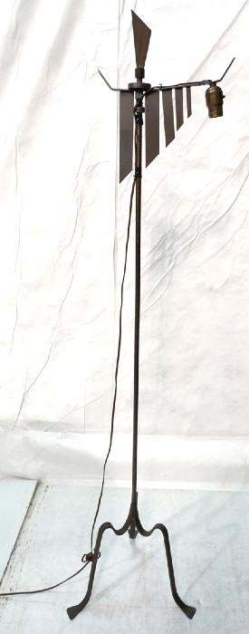Lot 237  -  Vintage Iron Floor Lamp. Tripod base. Bridge Lamp with metal fins/paddles hanging form bridge. -- Dimensions:  H: 64 inches: W: 16 inches --- 
