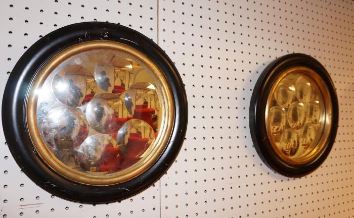 Lot 240  -  Pr Framed Round Wall Mirrors. Black & Gold Frames. Mirrors have relief dimpled deigns. -- Dimensions:  H: 14 inches --- 