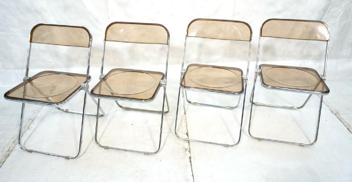 Lot 241  -  Set 4 CASTELLI Italy Acrylic Folding Chairs. DSC Chairs. Chrome frame with smoked lucite seat & back. Label. -- Dimensions:  H: 29.5 inches: W: 18.5 inches: D: 19 inches --- 