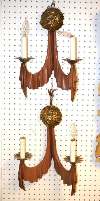 Lot 250  -  Pr Decorator Wall Sconces. Two Arms: Draped Design. Brass medallion with crumpled texture.-- Dimensions:  H: 18 inches: W: 12 inches --- 