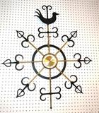 Lot 284  -  Brass & Black Metal Bird Wall Clock. Small round clock with star burst design rays. WESTWOOD 8 day.-- Dimensions:  H: 37 inches: W: 31 inches --- 