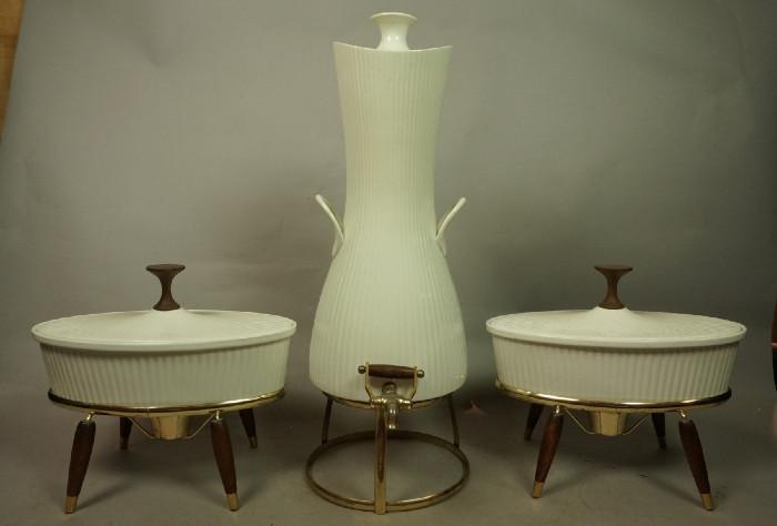 Lot 293  -  Set ERNEST SOHN CREATIONS Drink Server. Modernist Ribbed Cream Color Ceramic set. Two lidded Casseroles. One lidded Coffee Beverage Server. Metal bases. Wood finial  handles. Marked -- Dimensions:  H: 22.5 inches: W: 8.5 inches: D: 12 inches --- 