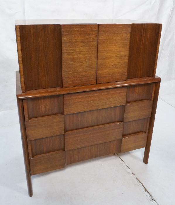 Lot 298  -  EDMUND SPENCE Mans Dresser. Two Doors over Four Drawers. Shaped Panel Front. Marked Made in Sweden; Has Circle mark.-- Dimensions:  H: 48.5 inches: W: 41.25 inches: D: 20 inches --- 