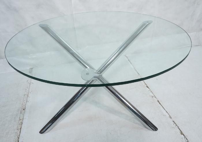 Lot 303  -  1970's Modern ROCHE BOBOIS Chrome Dining Table. 3/4" thick Glass top on 3 legged chrome tubular base. Not marked. -- Dimensions:  H: 27.5 inches: W: 47 inches: D: 47 inches --- 