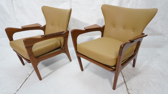 Lot 323  -  Pair Adrian Pearsall Lounge Chairs.  Flared backs on walnut frames.  Paddle arms.  Reupholstered in olive gold leather.-- Dimensions:  H: 31.5 inches: W: 27.5 inches: D: 31 inches --- 