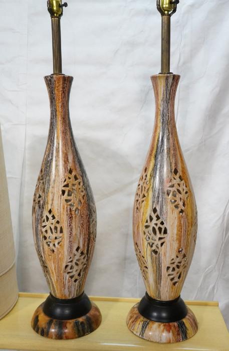 Lot 331  -  Large Pair Pottery Table Lamps.  Cut design with drippy glaze.  -- Dimensions:  H: 53 inches: W: 8.5 inches --- 
