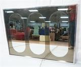 Lot 333  -  Carvers Guild Wall Mirror.  Mirror mounted with smoked acrylic cut with three ovals.-- Dimensions:  H: 35.25 inches: W: 48.25 inches --- 