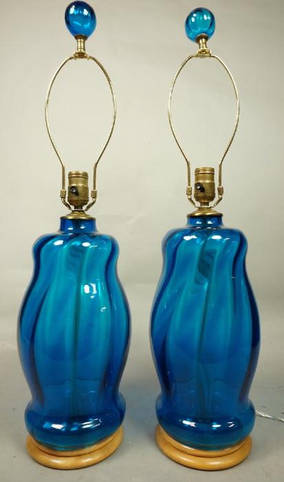 Lot 367  -  Pair Blue Glass Table Lamps with Matching Glass Finials.-- Dimensions:  H: 28 inches: W: 7.5 inches --- 