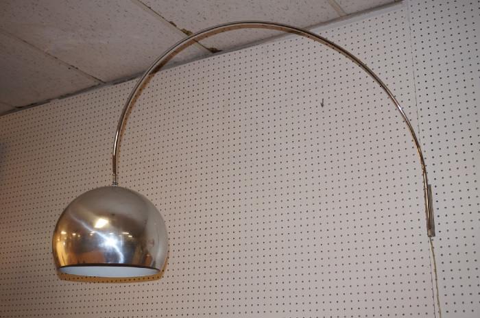 Lot 401  -  70's Modern Arc Wall Lamp.  Chrome.  Wall mount arch arm with ball form shade.-- Dimensions:  H: 35 inches: W: 47 inches --- 