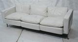 Lot 403  -  Robert Haussman Stendig Leather Sofa Couch.  White leather on stainless steel frame.-- Dimensions:  H: 31 inches: W: 85 inches: D: 32 inches --- 